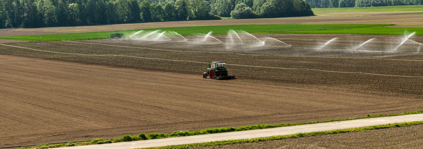 Agricultural landscape with tractor